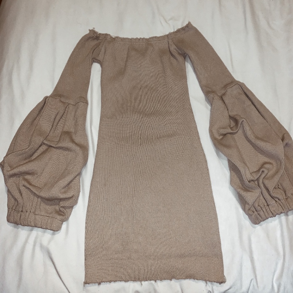 Nude off the shoulder dress.